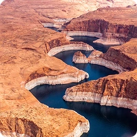 An aerial view of Navajo Canyon on Lake Powell, Thursday, April 14, 2022. The high water mark is near the boundary between Glen Canyon National Recreation Area and the Navajo Nation.